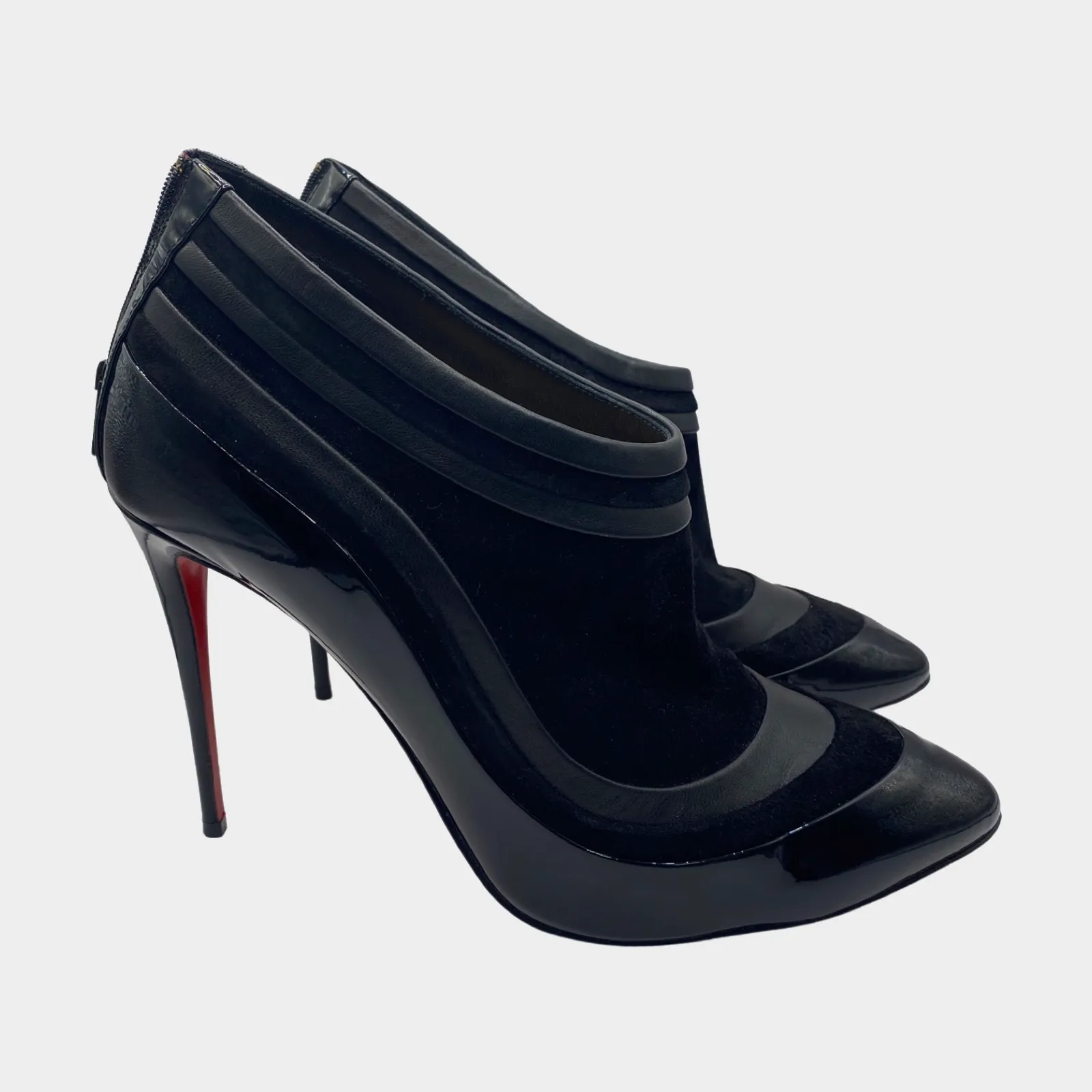 Christian Louboutin low cut black suede ankle boots with patent leather bottom panel